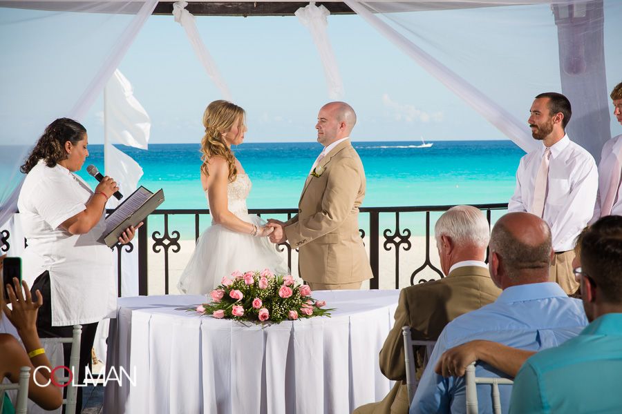 IMAGE: http://i182.photobucket.com/albums/x148/jcolman_photo/Danny%20and%20Amy-Cancun/wedding-309_zps8f686a75.jpg