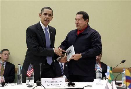 Obama shake the hand of Hugo Chavez Pictures, Images and Photos