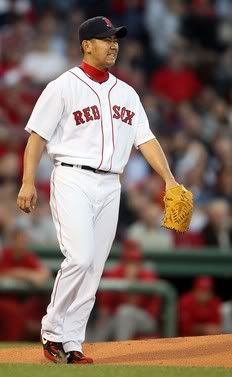 Daisuke Matsuzaka #18 of the Boston  Red Sox reacts after giving up a 2RBI double in the first inning against the Los Angeles Angels of Anaheim on May 6, 2010 at Fenway Park in Boston, Massachusetts (Getty Images)