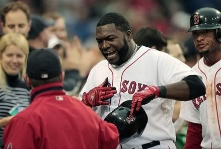 Boston  Red Sox's David Ortiz, center, celebrates his two-run home run that also drove in teammate Darnell McDonald, right, in the third inning of a baseball game against the Arizona Diamondbacks, Thursday, June 17, 2010, in Boston - AP Photo