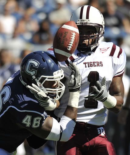 UConn's Sio Moore attempts to grab a pass intended for Texas Southern's Joe Anderson, right