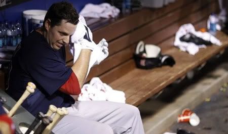 Boston Red Sox  pitcher John Lackey  wipes his face in the dugout after pitching in the fourth inning of a baseball game against the Philadelphia Phillies, Friday, May 21, 2010, in Philadelphia. Philadelphia won 5-1 (AP Photo)