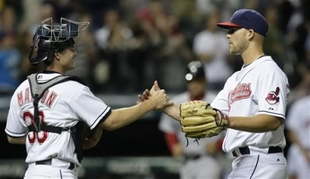 Cleveland Indians pitcher Justin Masterson, right, is congratulated by catcher Lou Marson after they defeated the Boston Red Sox 11-0 in a baseball game on Wednesday, June 9, 2010, in Cleveland. Masterson faced the Red Sox for the first time and earned his second-straight win after a long losing streak. The right-hander struck out six, walked two and allowed a pair of harmless one-out singles. - AP Photo