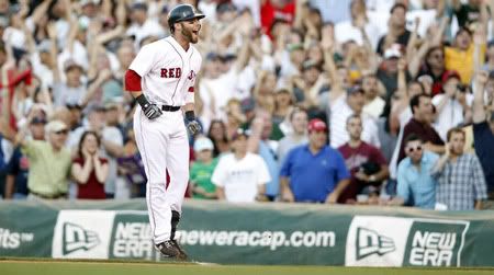 Boston  Red Sox Dustin Pedroia celebrates as he watches teammate Daniel Nava score on his game-winning RBI single against the Los Angeles Dodgers during the ninth inning of their MLB inter-league baseball game at Fenway Park in Boston, Massachusetts  June 19, 2010 - Reuters Pictures