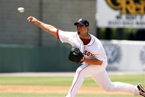 Boston Red Sox's Josh Beckett pitches for the Pawtucket  Red Sox in a baseball game against the Syracuse  Chiefs in a Triple-A rehab stint on Sunday, July 11, 2010, in Pawtucket, R.I.