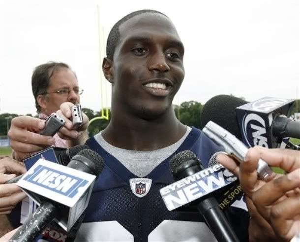 FILE - This June 16, 2010, file photo shows New England Patriots cornerback and first round draft choice Devin McCourty  talking with the media after football practice in Foxborough, Mass. McCourty has signed with the New England Patriots, according to his agent. Andy Simms tweeted Wednesday morning, July 28, 2010, that McCourty, a cornerback from Rutgers, had signed a contract and was in camp.