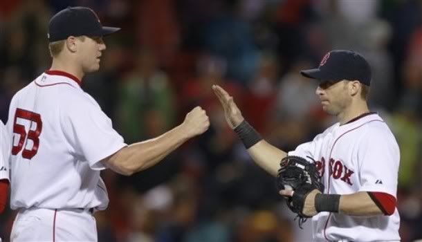 Boston Red Sox Marco Scutaro, right, is congratulated by teammate Jonathan Papelbon after beating the Seattle Mariners 6-3 in their baseball game in Boston, Monday Aug. 23, 2010. Scutaro had a two run single, breaking a 3-3 tie, and Papelbon got a save in the victory Boston Red Sox Marco Scutaro, right, is congratulated by teammate Jonathan Papelbon after beating the Seattle Mariners 6-3 in their baseball game in Boston, Monday Aug. 23, 2010. Scutaro had a two run single, breaking a 3-3 tie, and Papelbon got a save in the victory