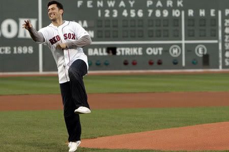Former Boston Red Sox Nomar Garciapara throws out the ceremonial first pitch during a pre-game ceremony to honor him before the Boston Red Sox take on the Los Angeles Angels in their American League MLB baseball game at Fenway Park in Boston, Massachusetts May 5, 2010 (Reuters Pictures)