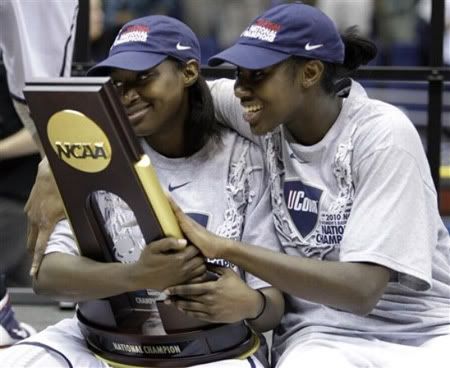 Connecticut's Kalana Greene, left, and Tina Charles, right, celebrate with the trophy following the women's NCAA Final Four college basketball championship game against Stanford Tuesday, April 6, 2010, in San Antonio. Connecticut won 53-47 (AP Photo)