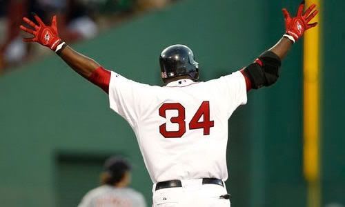 Boston Red Sox's David Ortiz celebrates his game winning hit during the bottom of the ninth inning of their 5-4 win over the Detroit Tigers in a baseball game at Fenway Park in Boston Saturday, July 31, 2010. (AP Photo/Winslow Townson)