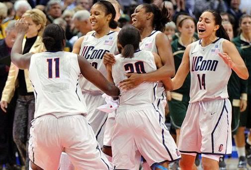 Connecticut players celebrate their 65-64 victory over Baylor in an NCAA college basketball game in Hartford, Conn., on Tuesday, Nov. 16, 2010. 