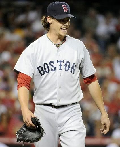Clay Buchholz #11 of the Boston Red Sox reacts to the third out of the Los Angeles Angels during the seventh inning at Angel Stadium on July 26, 2010 in Anaheim, California. (Photo by Harry How/Getty Images)