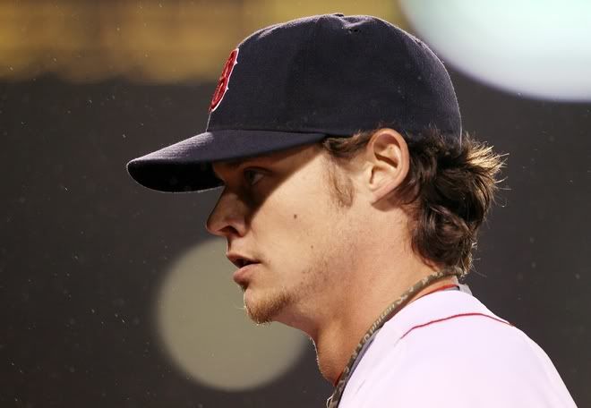 Clay Buchholz(notes) #11 of the Boston Red Sox heads for the dugout after the eighth inning against the Minnesota Twins on May 19, 2010 at Fenway Park in Boston, Massachusetts. (Photo by Elsa/Getty Images)