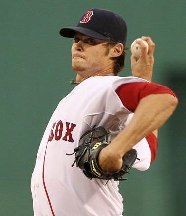 Boston Red Sox starting pitcher Clay Buchholz delivers during the first inning of a MLB baseball game against the Los Angeles Angels at Fenway Park in Boston Monday, May 3, 2010. (AP Photo/Winslow Townson)