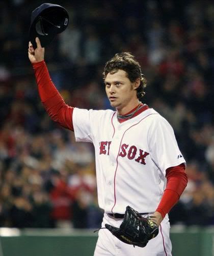 Boston Red Sox starting pitcher Clay Buchholz tips his cap as he comes out of the baseball game against the Minnesota Twins in the ninth inning, Wednesday, May 19, 2010, in Boston. The Red Sox won 3-2. (AP Photo/Michael Dwyer)