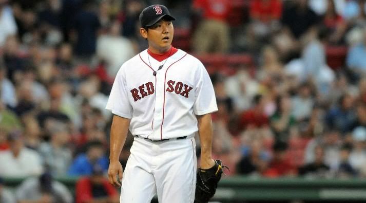 Daisuke Matsuzaka #18 of the Boston Red Sox walks back to the dugout after the first inning against the Cleveland Indians August 5, 2010 at Fenway Park in Boston, Massachusetts. (Photo by Darren McCollester/Getty Images)