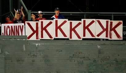 Boston Red Sox fans post the number of strikeouts by starting pitcher Jon Lester(notes) during Boston's 6-2 win over the Arizona Diamondbacks in a baseball game at Fenway Park in Boston Wednesday, June 16, 2010. Lester had seven strikeouts in seven innings. - AP Photo