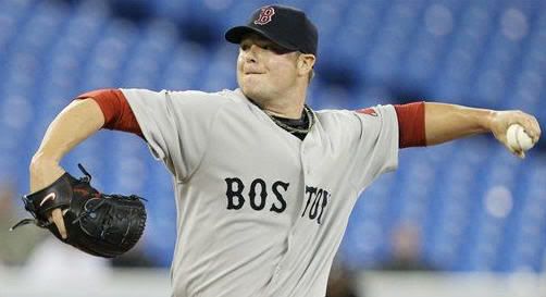 Boston Red Sox pitcher Jon Lester works against the Toronto Blue Jays during first-inning baseball game action in Toronto, Wednesday, April 28, 2010. (AP Photo/The Canadian Press,Darren Calabrese)