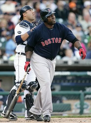 Boston Red Sox's David Ortiz, front, and Detroit Tigers catcher Gerald Laird watch the three-run home run hit by Ortiz in the first inning of a baseball game Friday, May 14, 2010, in Detroit. (AP Photo/Duane Burleson)