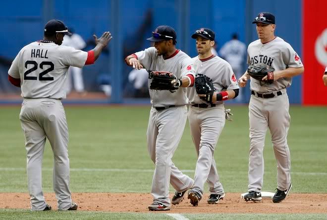 TORONTO - JULY 11: The Boston Red Sox celebrate a win after the game against the Toronto Blue Jays at the Rogers Centre July 11, 2010 in Toronto, Ontario, Canada. (Photo by Abelimages/Getty Images)