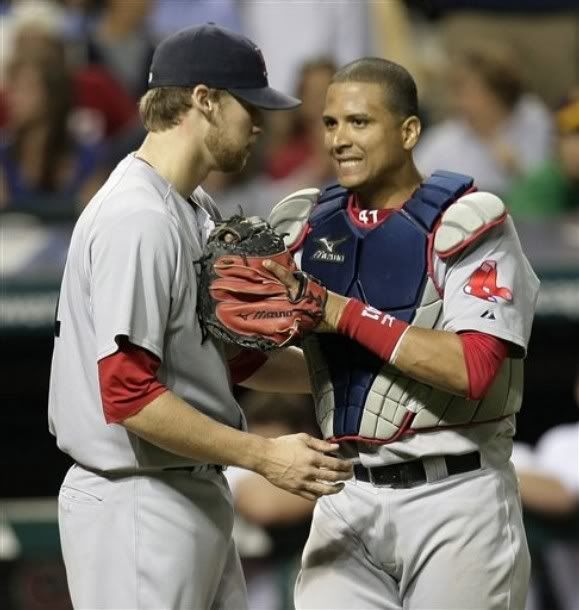 Boston Red Sox catcher Victor Martinez, right, talks with teammate Daniel Bard in the ninth inning in a baseball game on Thursday, June 10, 2010, in Cleveland. Cleveland Indians' Russell Branyan hit a game-winning two-run single off Bard in the ninth inning for the Indians' 8-7 win - AP Photo