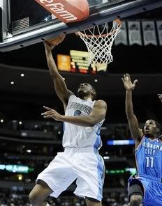 Denver Nuggets shooting guard Arron Afflalo goes up for a shot against Oklahoma City Thunder guard Jerome Dyson (11) during the second half of a preseason NBA basketball game Tuesday, Oct. 19, 2010, in Denver. Denver beat Oklahoma City 130-115.