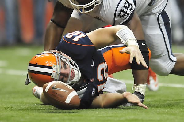 UConn's Kendall Reyes sacks Syracuse quarterback Ryan Nassib, forcing a fumble and setting up a third-quarter UConn touchdown Saturday. 