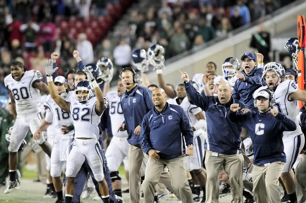 UConn's bench reacts as Dave Teggart kicks a 52-yard field goal to take the Huskies over the University of South Florida 19-16 at the Raymond James Stadium in Tampa Saturday for the last game of the regular season. With the win, they have earned a BCS berth.