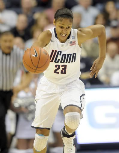 Maya Moore was strong on both offense and defense with 22 points, four blocks and and three steals in the first half against Marquette at Gampel Pavilion Thursday night. 