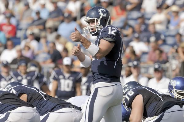  Cody Endres who replaced starting quarterback Zach Frazer midway through today's game, signals from the line during UConn's 45-21 defeat of Buffalo. Frazer threw for 94-yards with one interception and Endres threw for 139 yards with no interceptions (MARK MIRKO, HARTFORD COURANT).