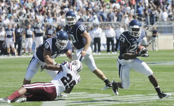  UConn quarterback Zach Frazer watches as Jordan Todman runs off of Anthony Sherman's block in the first half against Texas Southern on a play that set up Michael Smith's touchdown reception. 