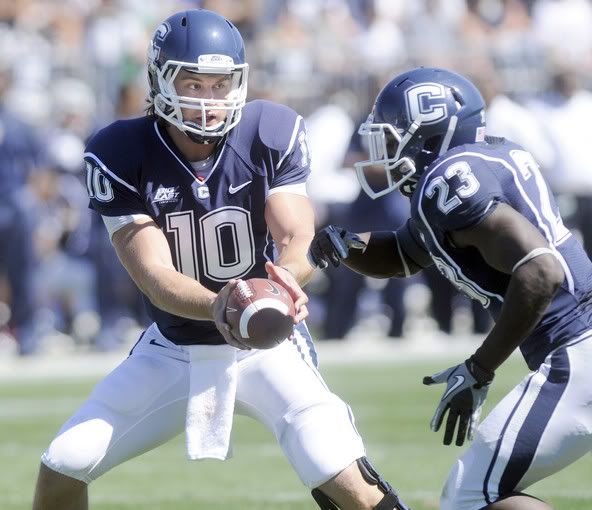  UConn quarterback Zach Frazer watches as Jordan Todman runs off of Anthony Sherman's block in the first half against Texas Southern on a play that set up Michael Smith's touchdown reception. 