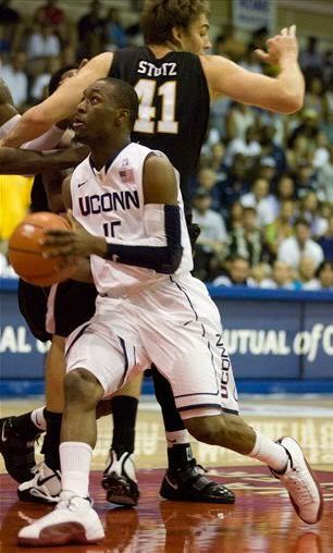 Connecticut guard Kemba Walker (15) drives to the basket while playing against Wichita State in the first half during the Maui Invitational in Lahaina,Hawaii Monday, Nov. 22, 2010.