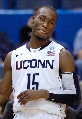 Connecticut's Kemba Walker reacts after scoring a career-high 42 points in Connecticut's 89-73 win over Vermont in an NCAA college basketball game in Hartford, Conn., on Wednesday, Nov. 17, 2010. 42 points is a career high for Walker. 
