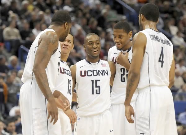 From left, Alex Oriakhi (17 points), Shabazz Napier (4 points), Kemba Walker (18 points), Roscoe Smith (8 points) and Jamal Coombs-McDaniel (9 points) huddle midway through the second half Tuesday as UConn pulled away to win 67-53 at the XL Center in Hartford. 