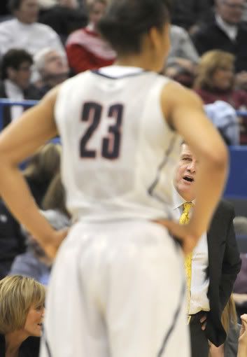 UConn coach Geno Auriemma has a word with Maya Moore in the first half. Moore took to the bench after 15 minutes after she picked up three fouls.