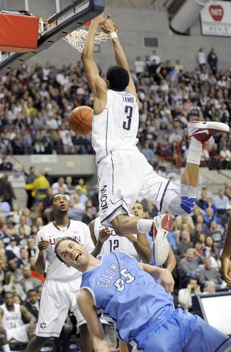 UConn's Jeremy Lamb dunks as he is fouled by Columbia center Mark Cisco during the Huskies' 70-57 win in their season opener at Gampel Pavilion Friday. Lamb was the leading scorer with 30 points. 