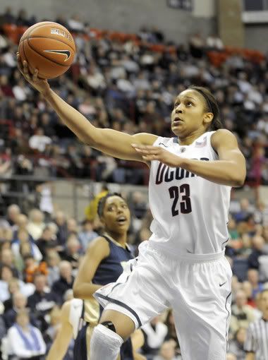 UConn's Maya Moore goes for a layup in the first half Saturday against the University of Pittsburgh at Gampel Pavilion.
