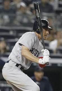 Boston Red Sox's Jacoby Ellsbury hits an RBI single during the seventh inning of a baseball game against the New York Yankees early Friday, June 10, 2011, at Yankee Stadium in New York.