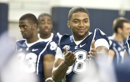 Wide Receiver Gerrard Sheppard (88) horses around with his teammates at the Mark R. Shenkman Training Center on the UConn campus in Storrs. The players had gathered to be photographed and interviewed by the media during media day in 2010