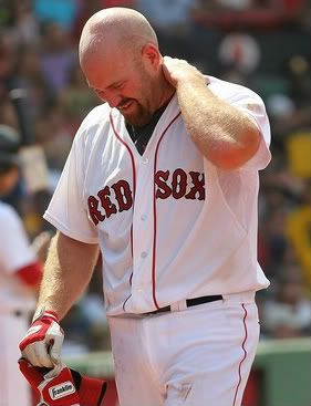 Kevin Youkilis #20 of the Boston Red Sox leaves the game after being hit by a pitch against the Toronto Blue Jays at Fenway Park on July 4, 2011 in Boston, Massachusetts.