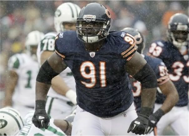 In this Dec. 26, 2010 file photo Chicago Bears' Tommie Harris celebrates during an NFL football game against the New York Jets in Chicago.