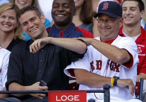 Boston Red Sox general manager Theo Epstein (L) and manager Terry Francona joke around during the official team and staff photo at Fenway Park in Boston, Massachusetts August 4, 2011.
