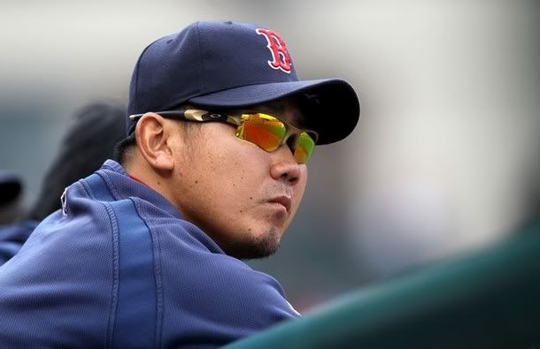 Pitcher Daisuke Matsuzaka #28 of the Boston Red Sox watches the game with the Los Angeles Angels of Anaheim on April 24, 2011 at Angel Stadium in Anaheim, California. The Red Sox won 7-0.