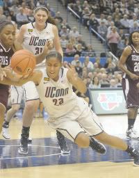 UConn freshman Kaleena Mosqueda-Lewis dives for the ball Tuesday against Texas A&M at the XL Center in Hartford. 