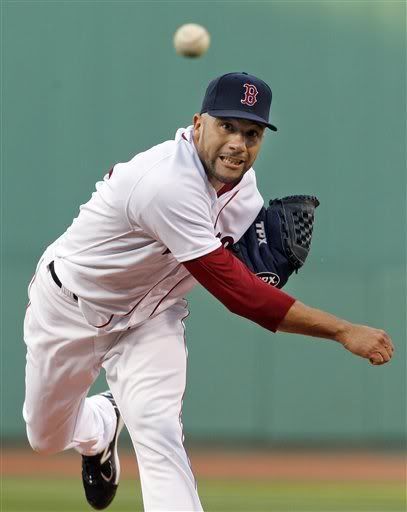 Boston Red Sox starting pitcher Alfredo Aceves(notes) delivers to the Chicago White Sox in the first inning of a baseball game at Fenway Park, Tuesday, May 31, 2011, in Boston .
