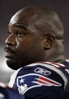 Albert Haynesworth #92 of the New England Patriots looks on from the sideline in the first half against the New York Giants on September 1, 2011 at Gillette Stadium in Foxboro, Massachusetts.
