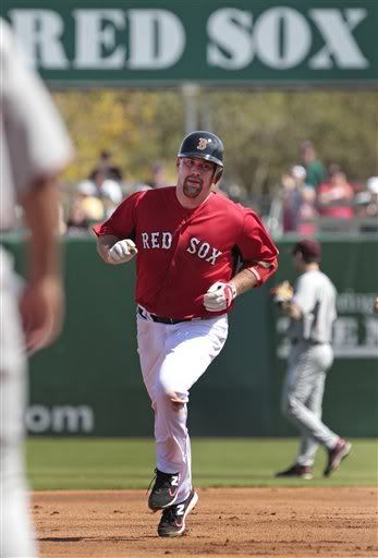 Boston Red Sox third baseman Kevin Youkilis(notes) rounds second after hitting a three run homer in the first inning against Boston College during their baseball game at the City of Palms Park in Fort Myers, Fla., Saturday, Feb. 26, 2011.