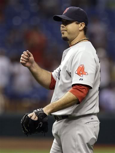 Boston Red Sox starting pitcher Josh Beckett(notes) reacts after closing out the Tampa Bay Rays in the ninth inning during a baseball game on Wednesday, June 15, 2011, in St. Petersburg, Fla. 
