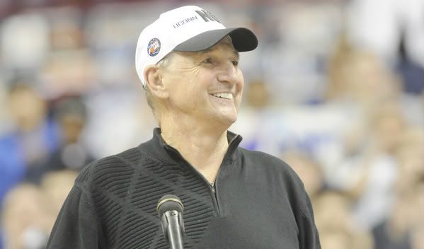 UConn coach Jim Calhoun looks out at the fans at the rally for the returning basketball team at Gampel Pavilion .